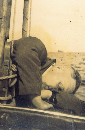 Man asleep on a boat